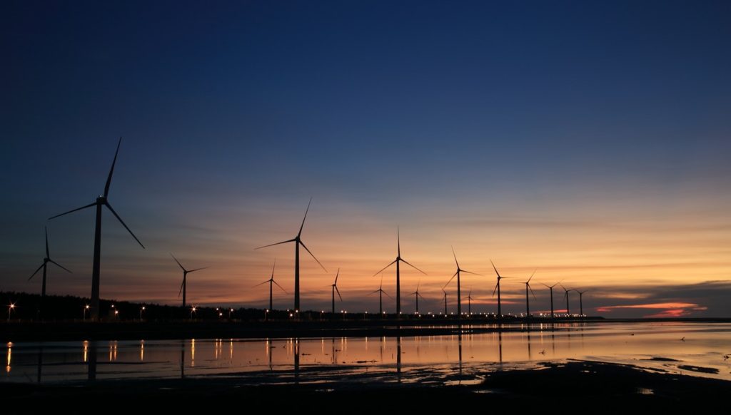 windmills along the shore