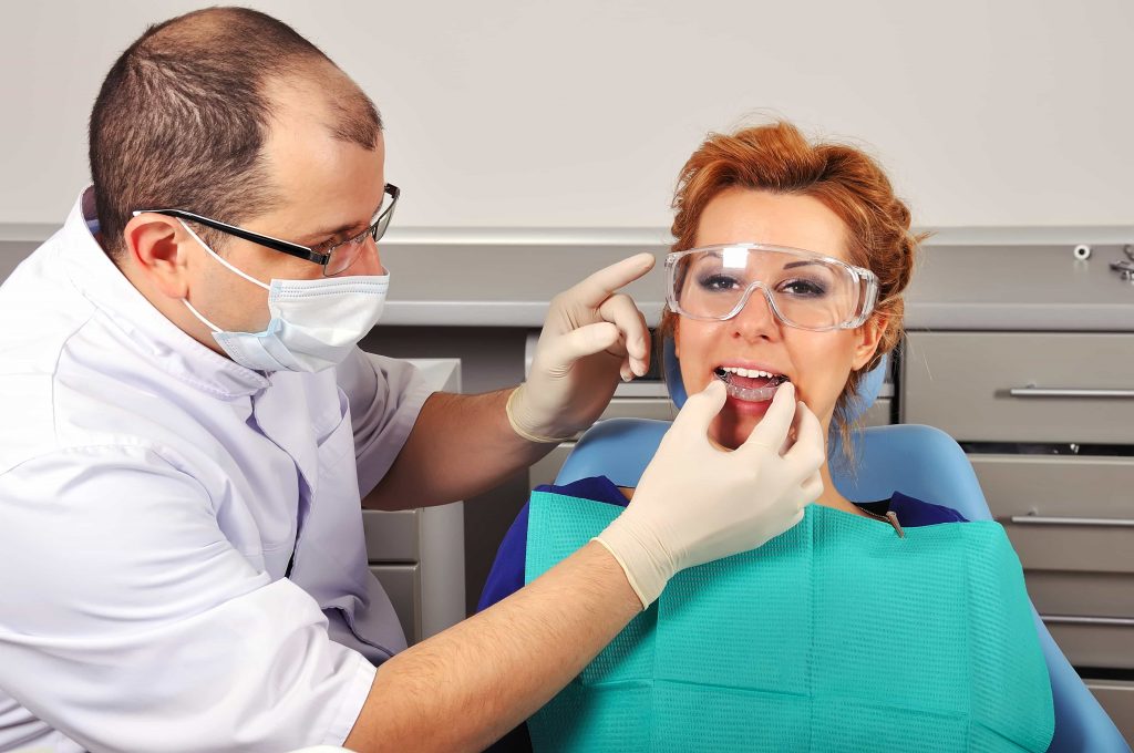 dentist installing dental splint
