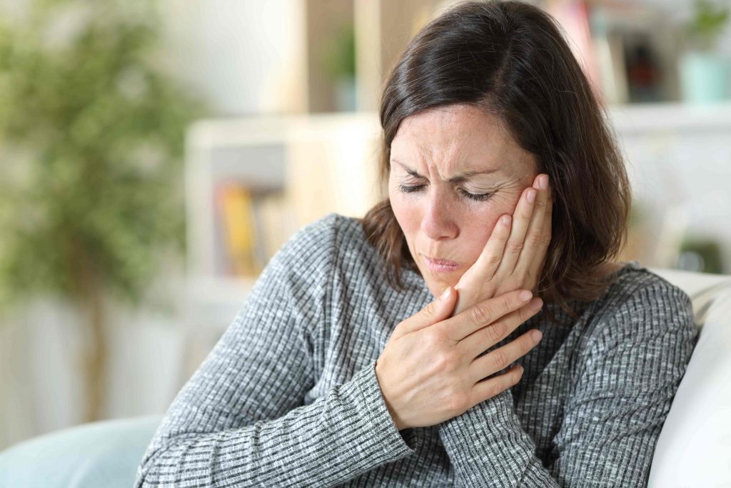 woman with jaw pain