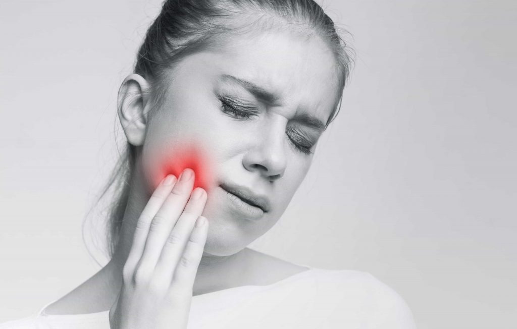 woman with severe toothache
